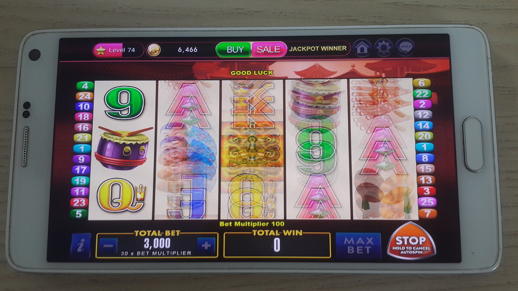 slot machine hitting spin button fast